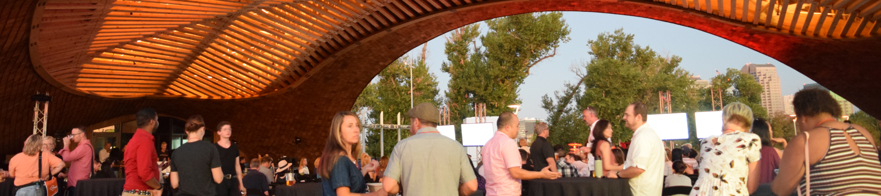 tedx talk at barn shot of residents standing under arch